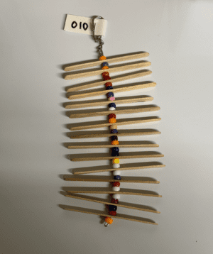 Popsicle sticks with colorful beads on a string.